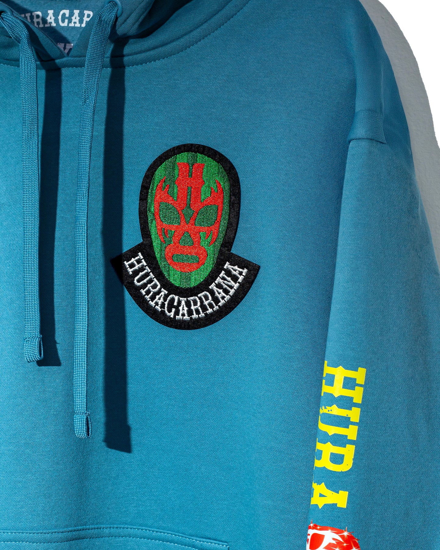 Hoodie celeste Huracarrana